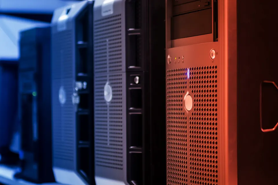 Servers lit in blue and red inside a data centre