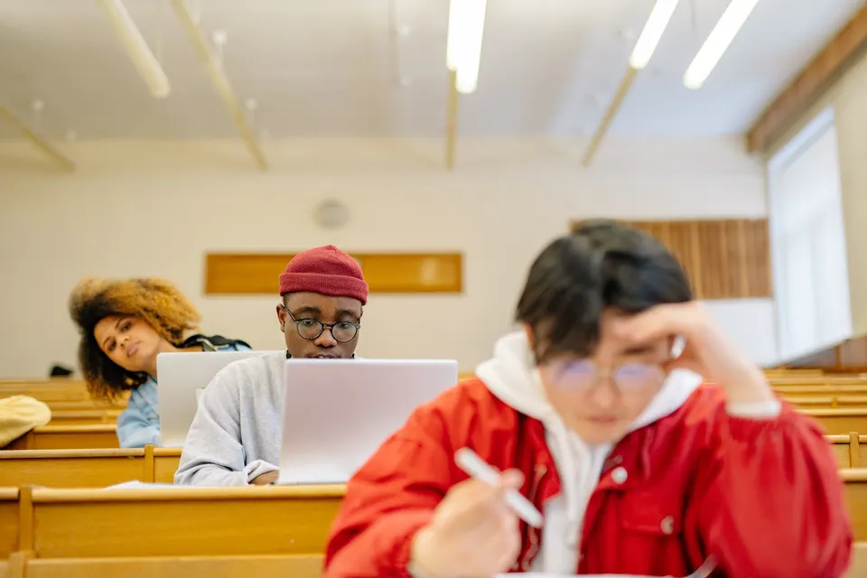 University students studying together in a classroom